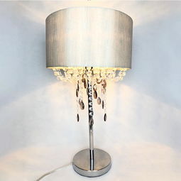 凤岗鸡毛灯罩与现代蚀刻桌灯 艺术与工艺的完美融合